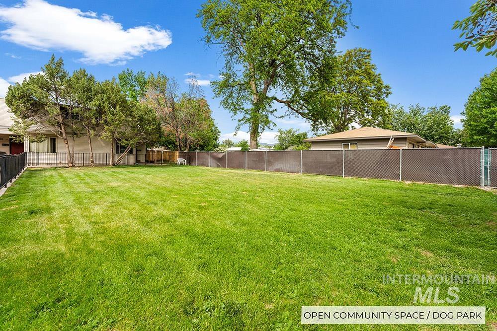 View of fenced backyard