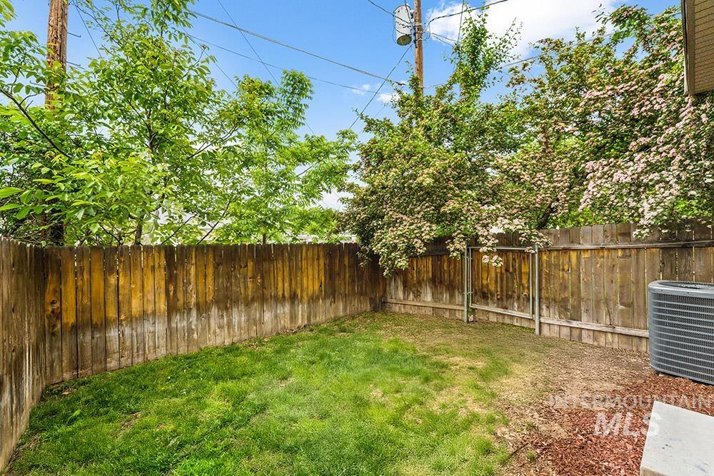 View of fenced backyard