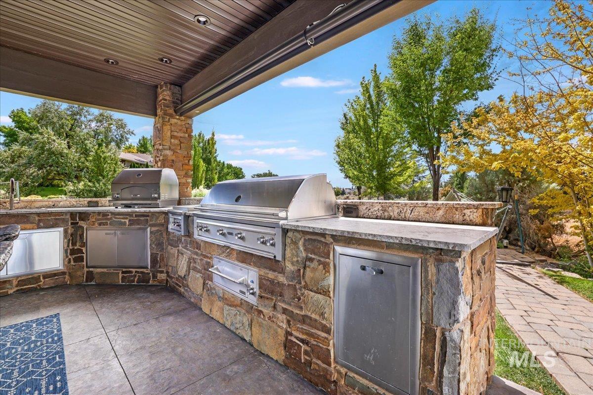 View of patio with an outdoor kitchen