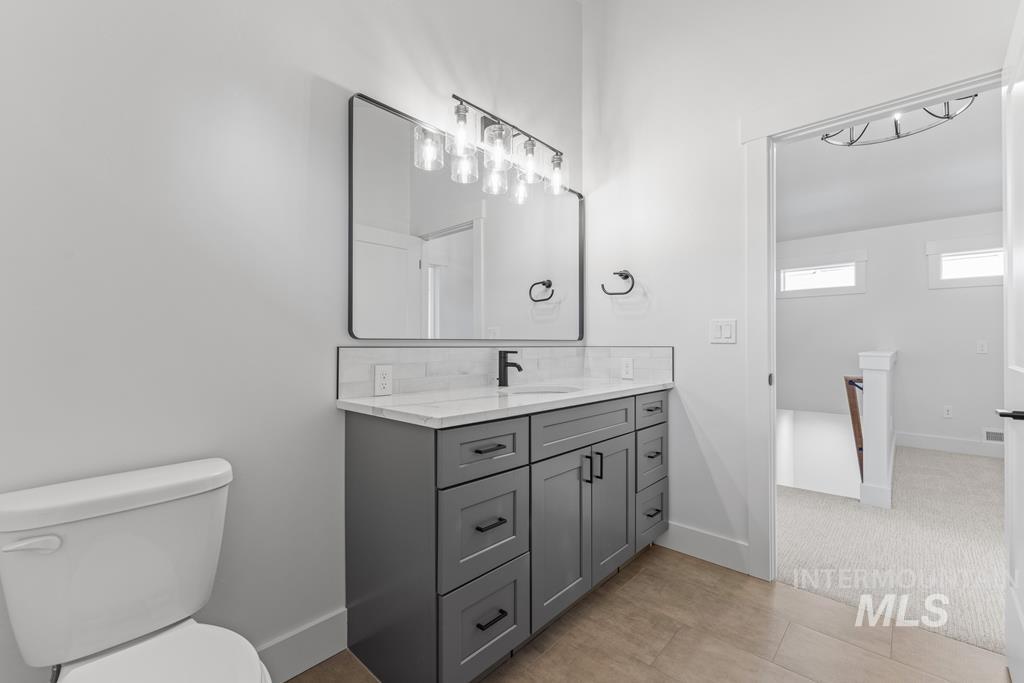 Bathroom with vanity and light tile patterned floors