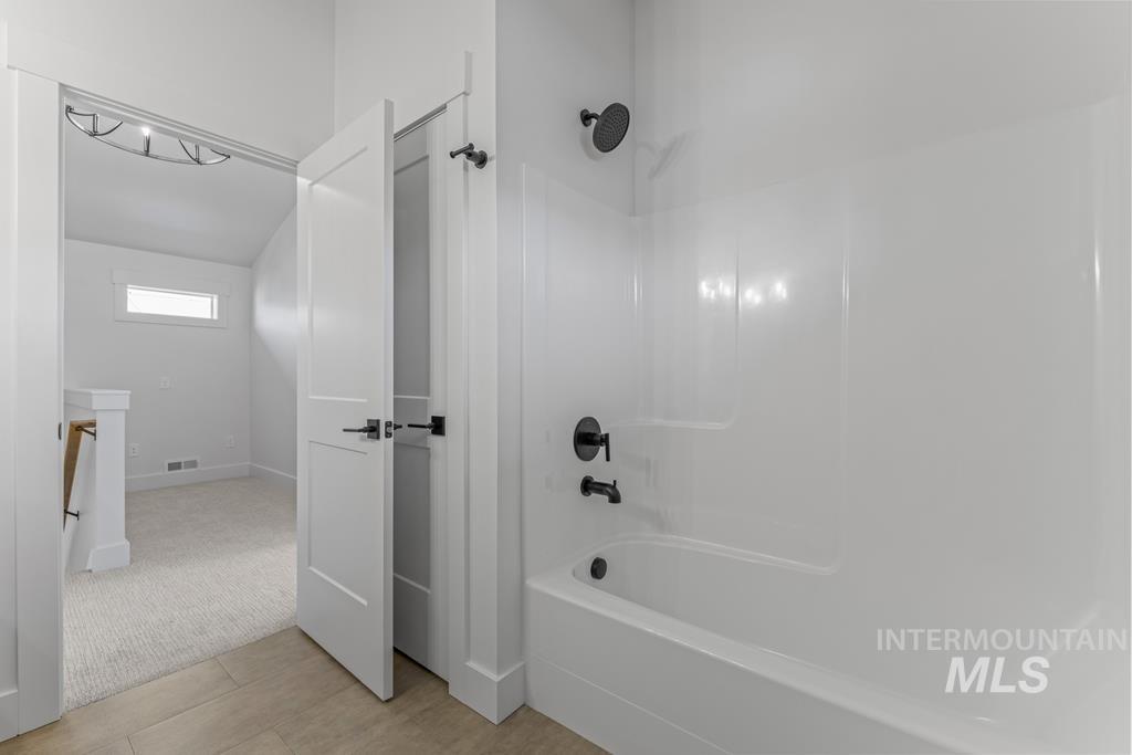 Bathroom featuring shower / tub combination