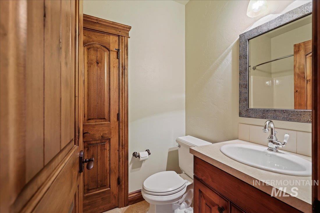 Bathroom with vanity and a shower