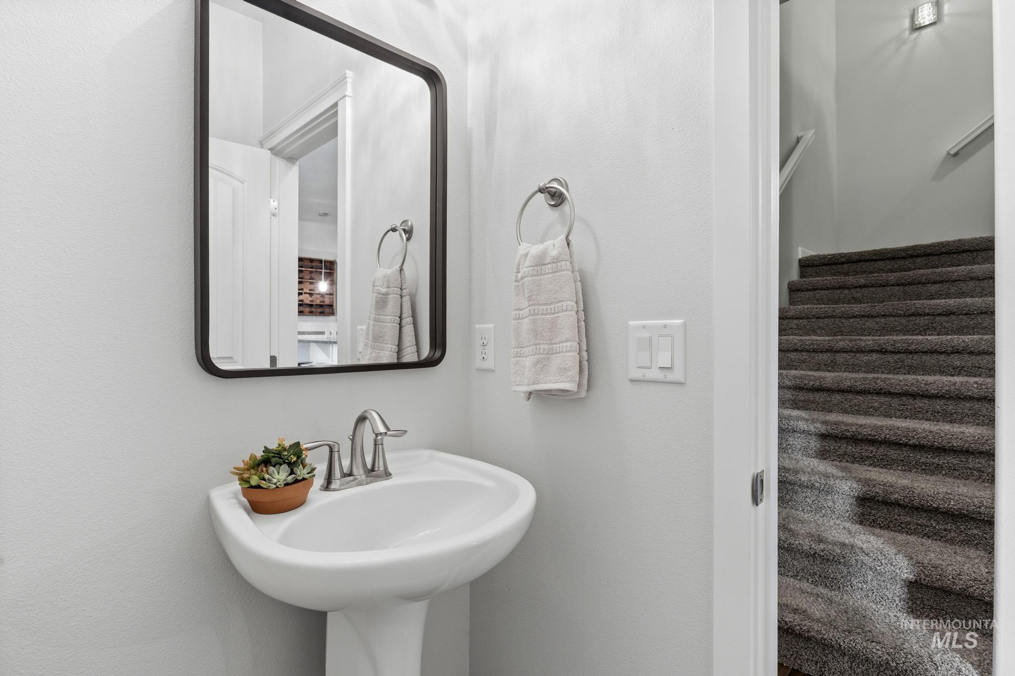 Bathroom featuring a textured wall
