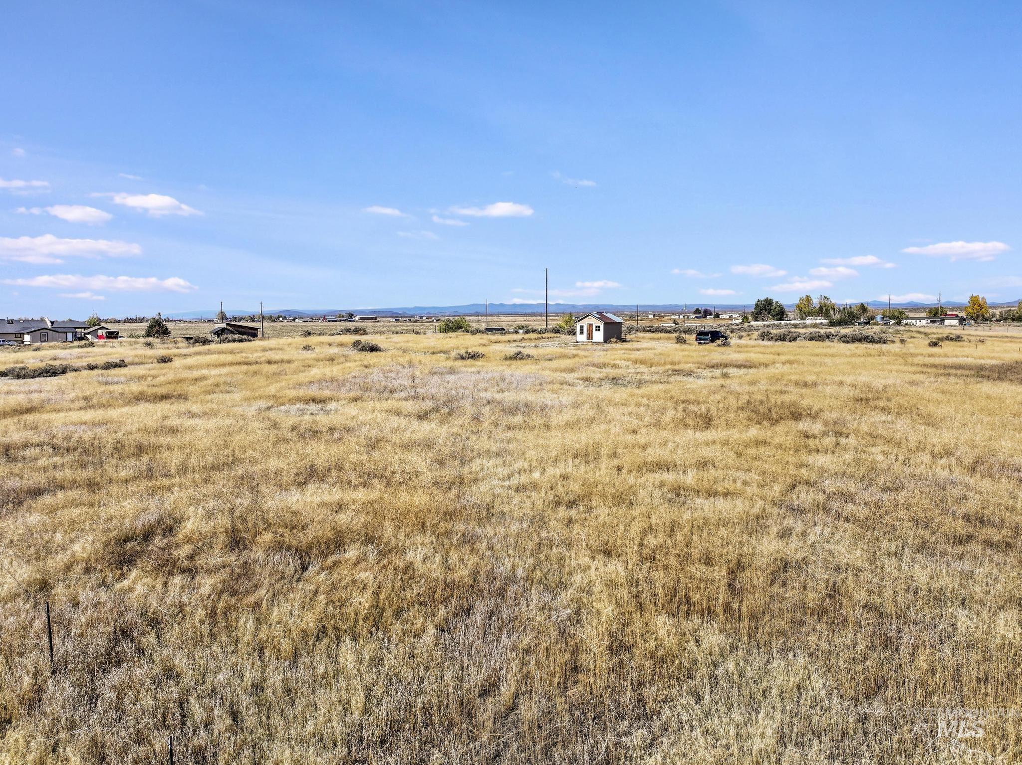 View of yard with a view of rural / pastoral area