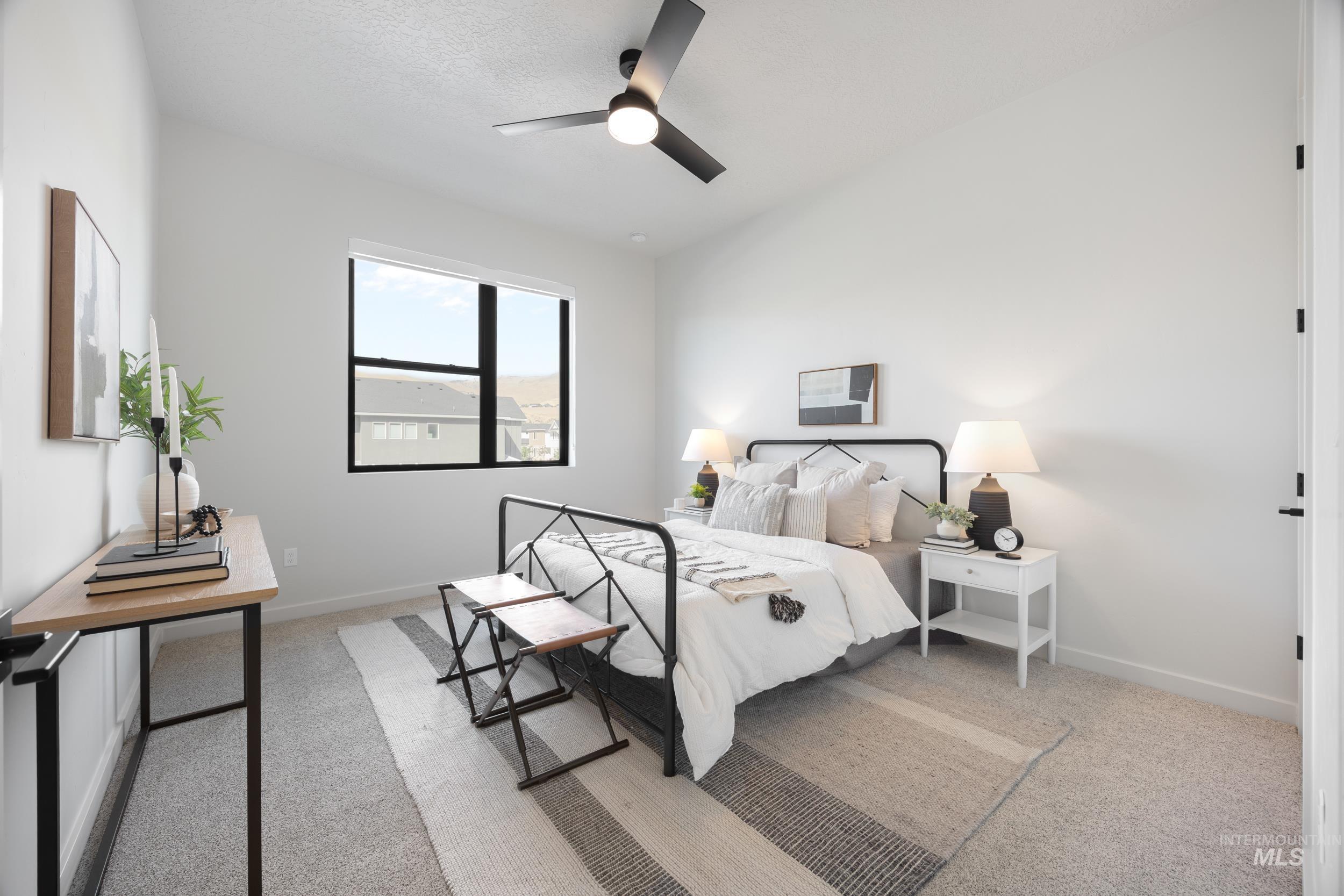 Carpeted bedroom with baseboards