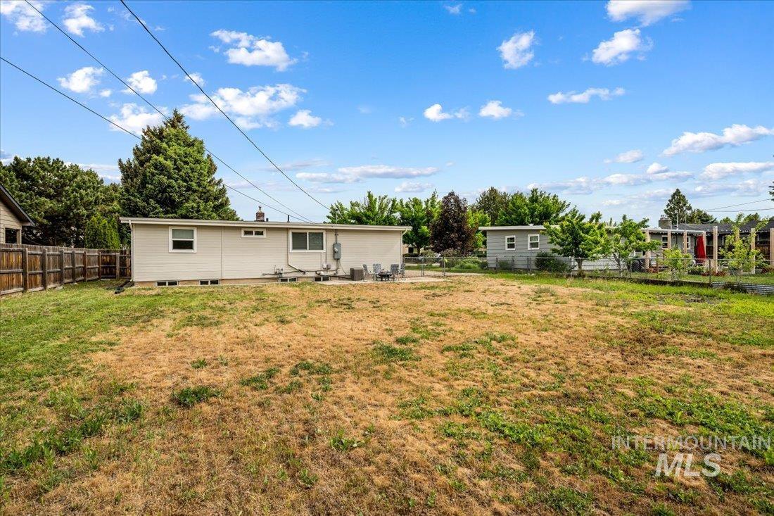 View of fenced backyard