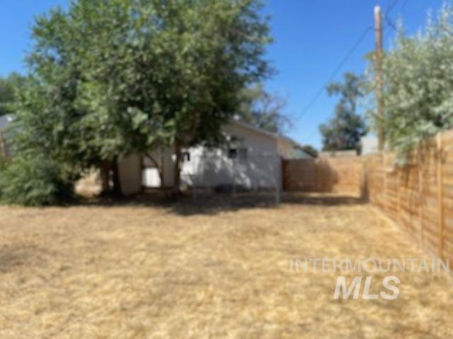 View of fenced backyard