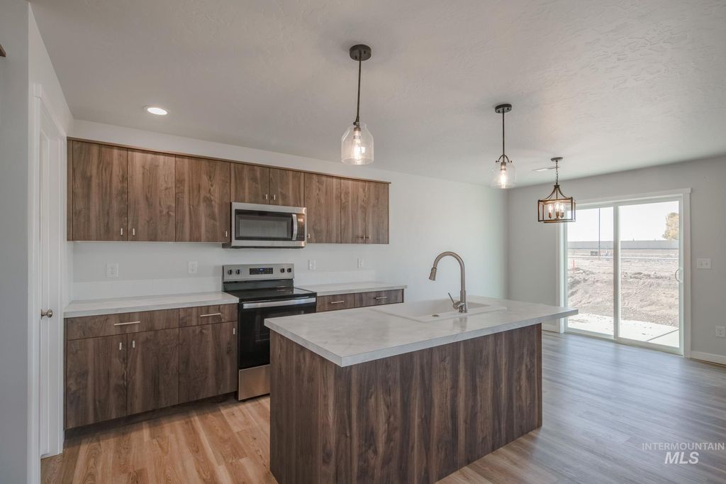 Photo of 309 N Coltsfoot Ave, Kuna, ID 83634 (MLS # 98967510)