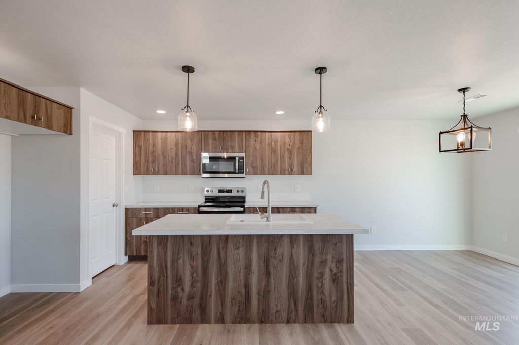 Photo of 309 N Coltsfoot Ave, Kuna, ID 83634 (MLS # 98967510)