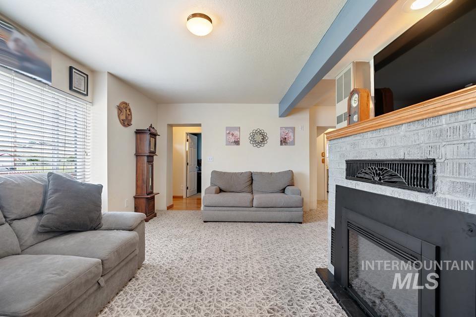 Living area featuring a fireplace