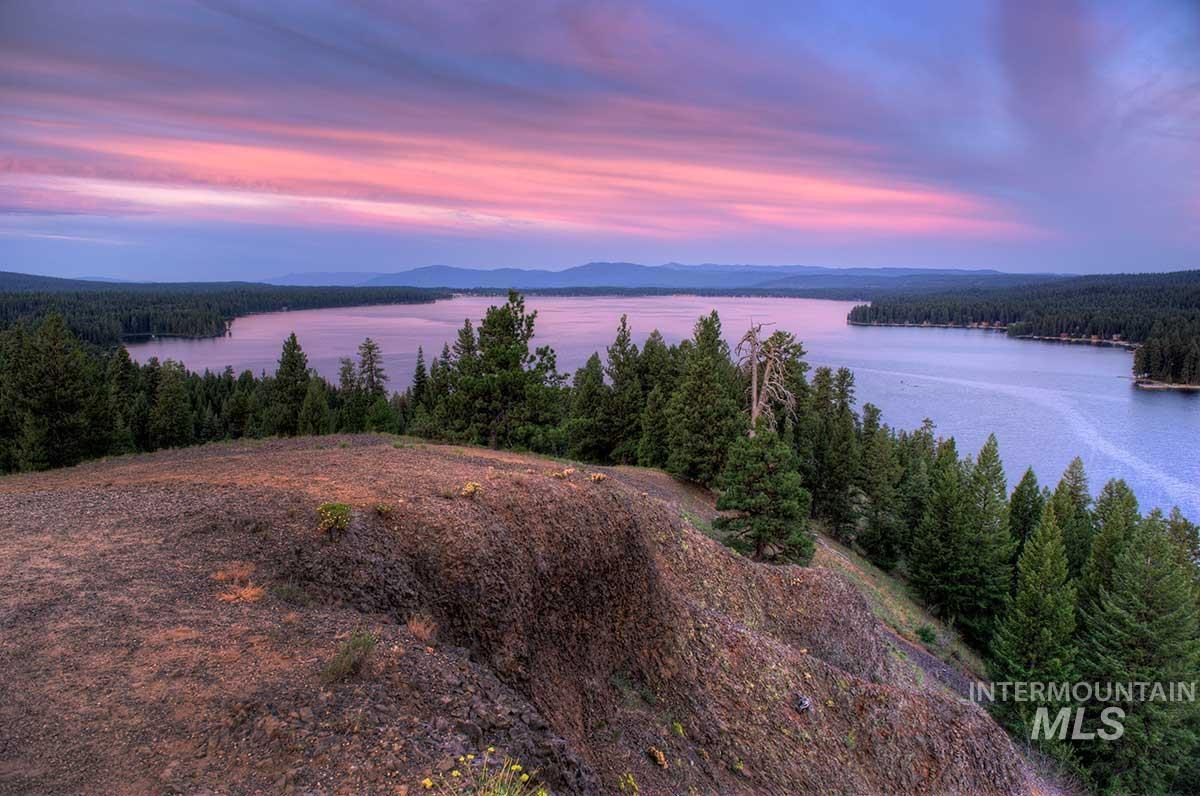 Water view featuring a heavily wooded area