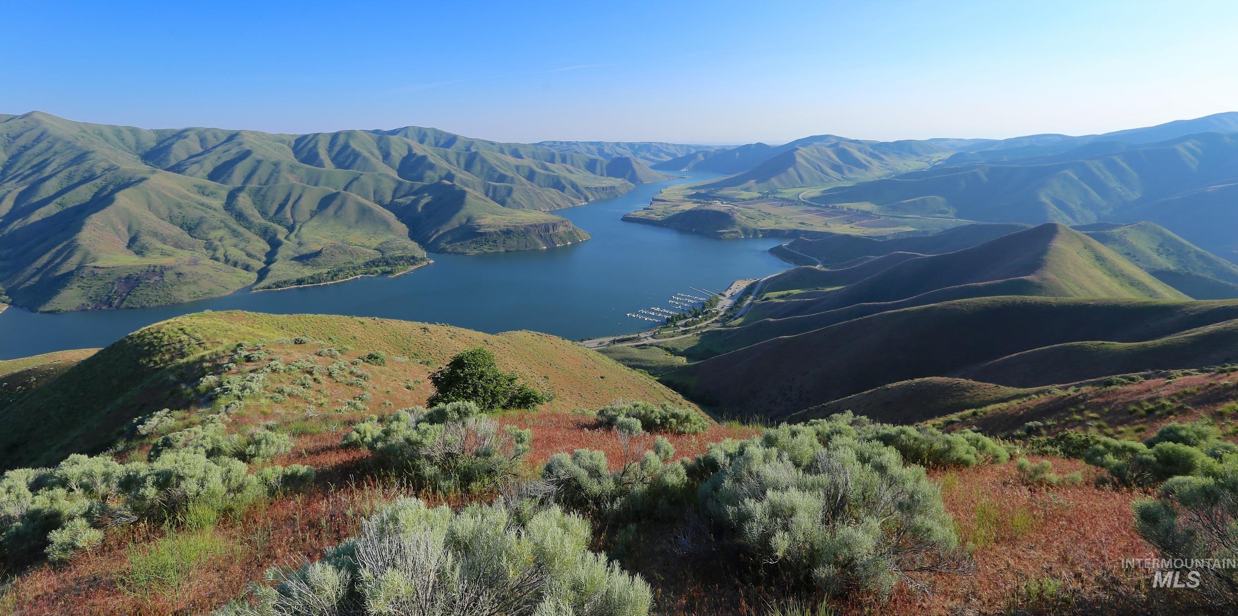 View of mountain backdrop with a large body of water