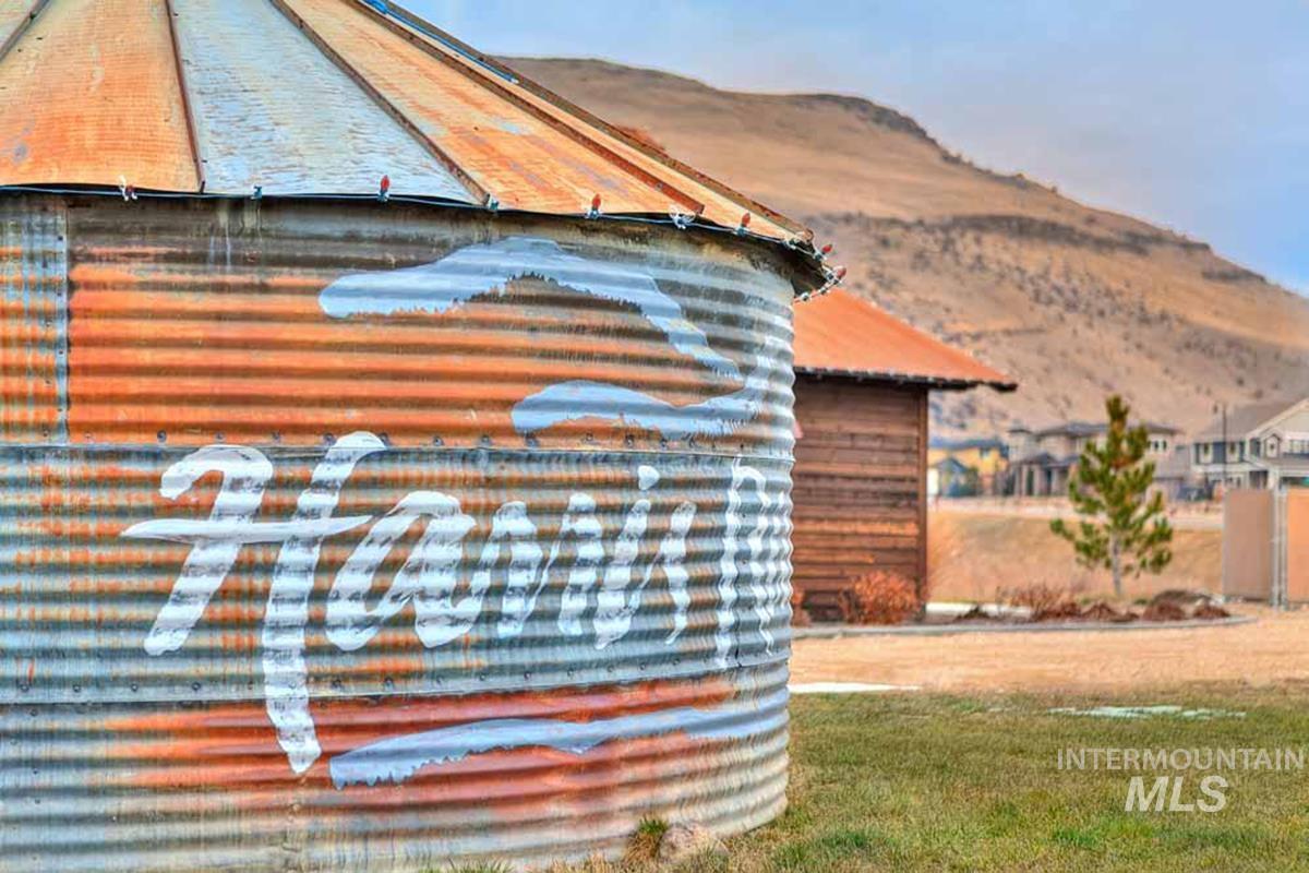 View of home's exterior featuring a mountain view and a yard