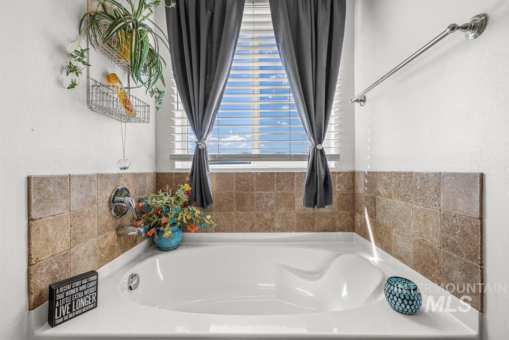 Bathroom featuring a bath