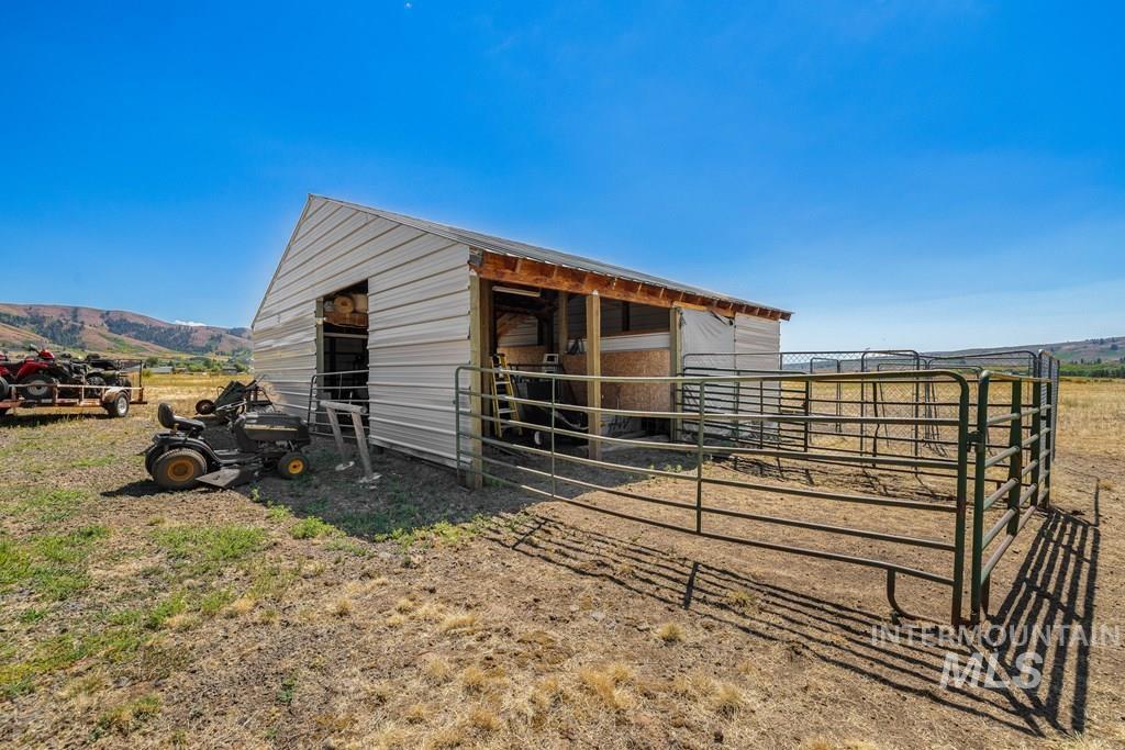 Stable featuring a mountain view