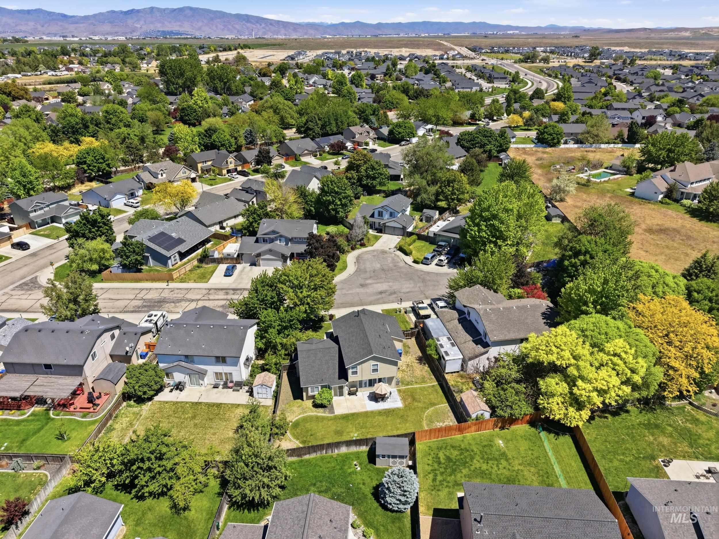 Aerial perspective showcasing a residential neighborhood with varied architectural styles