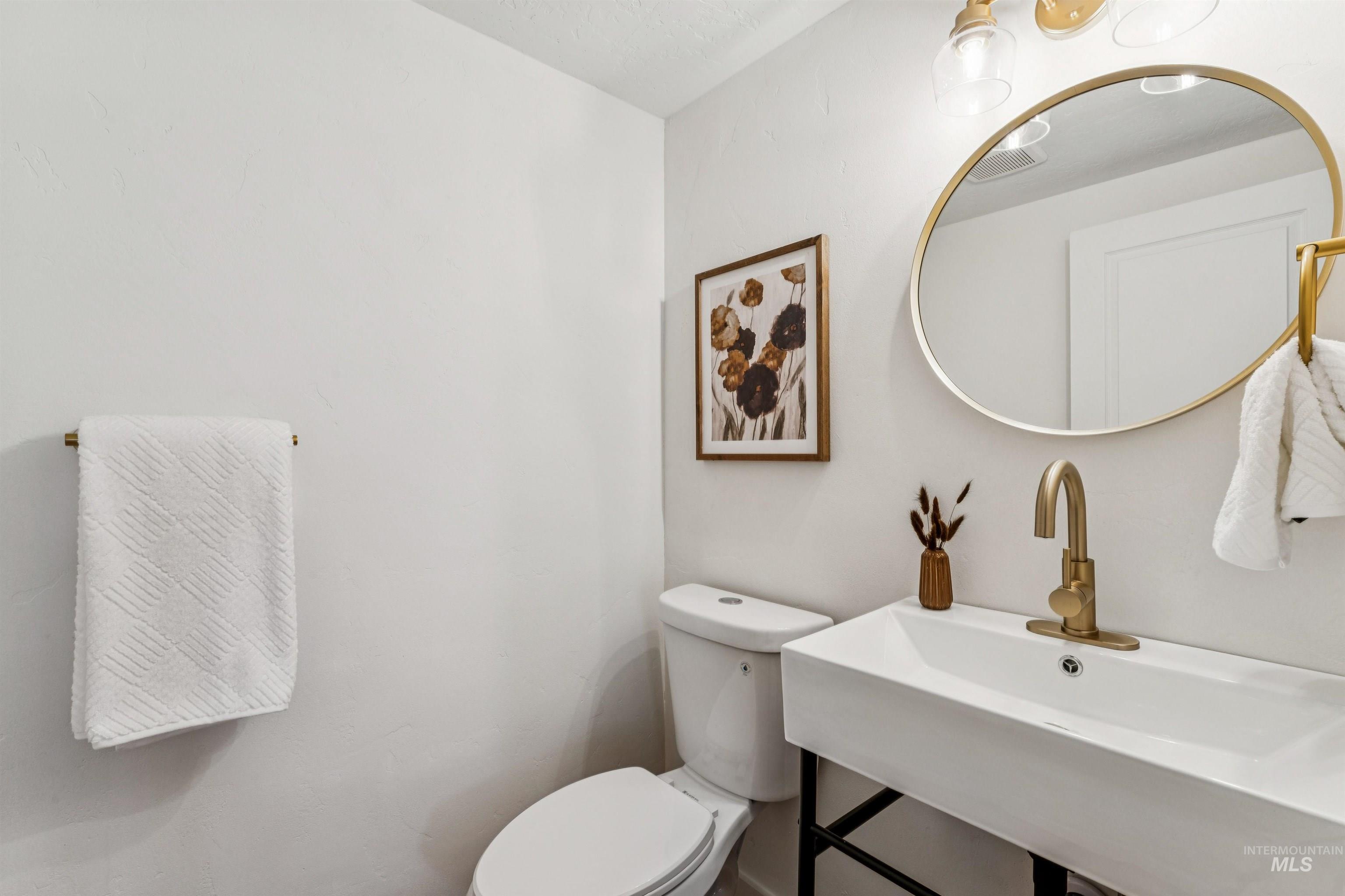 Bathroom with toilet and a sink