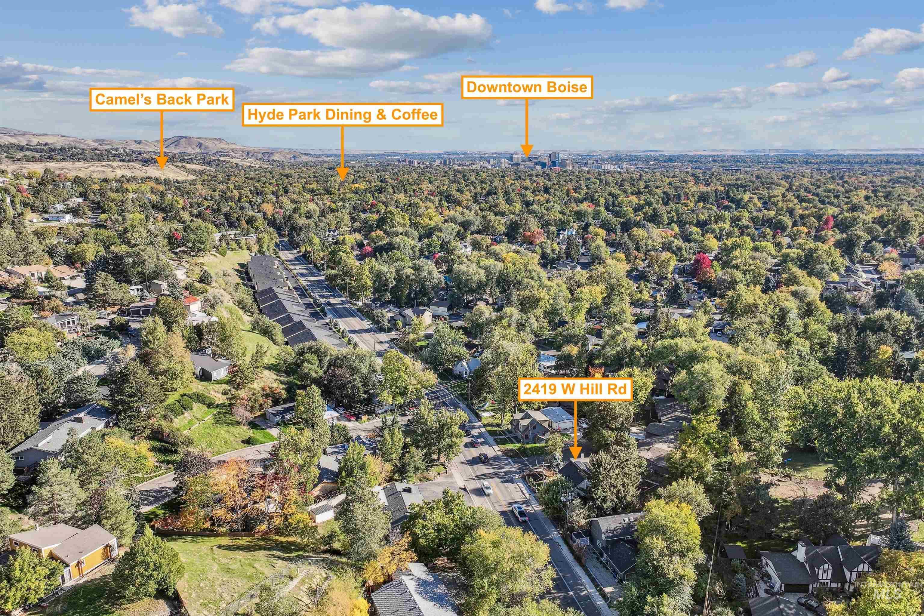 Aerial overview of property's location with nearby suburban area