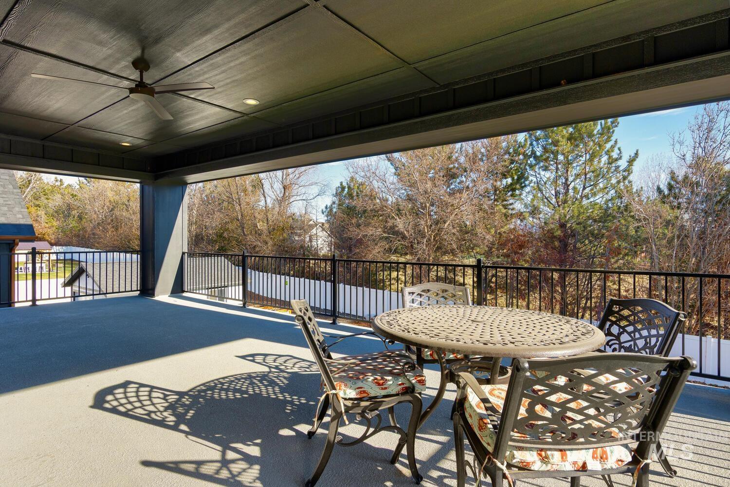 View of patio / terrace with a ceiling fan and outdoor dining area