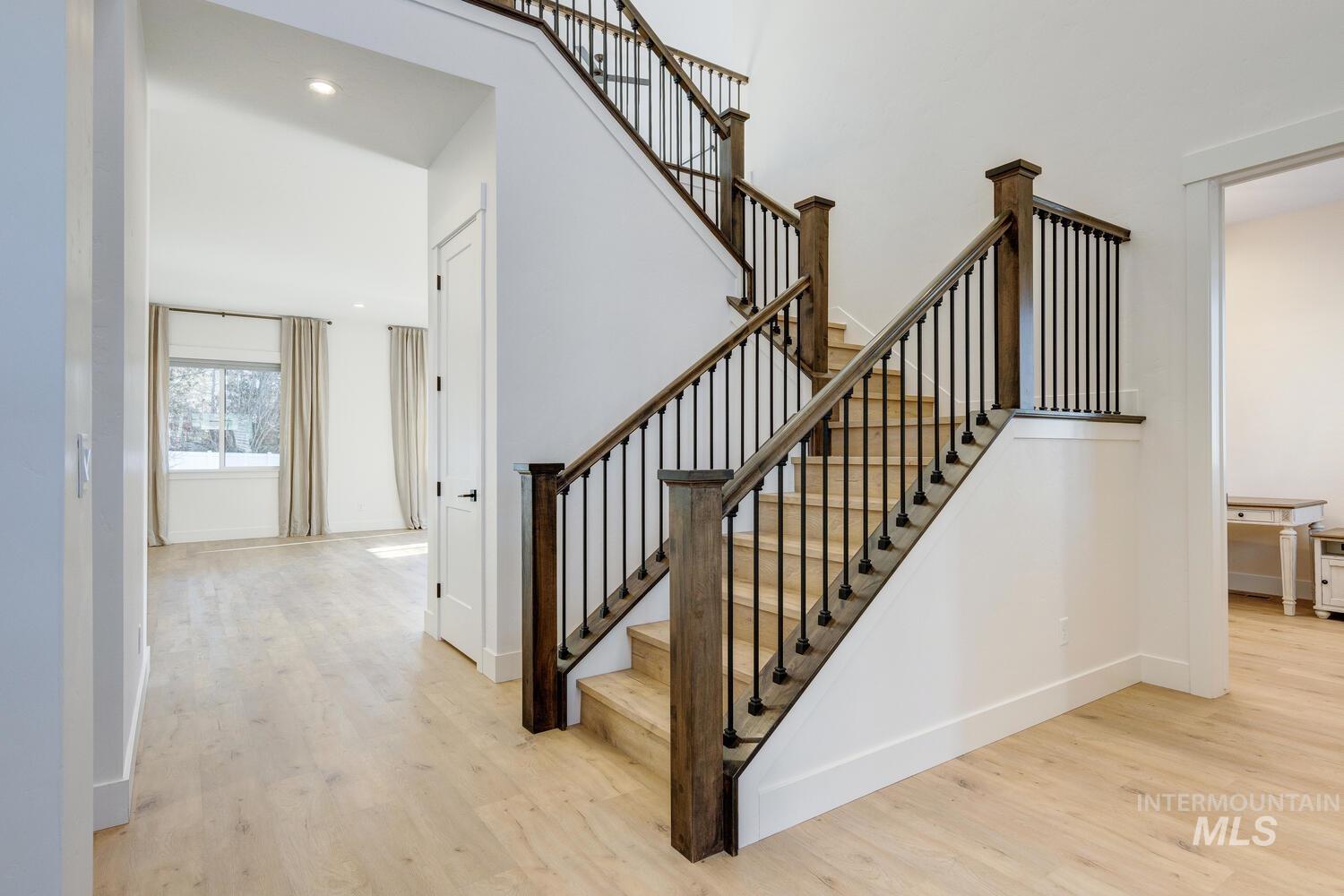 Staircase with wood finished floors