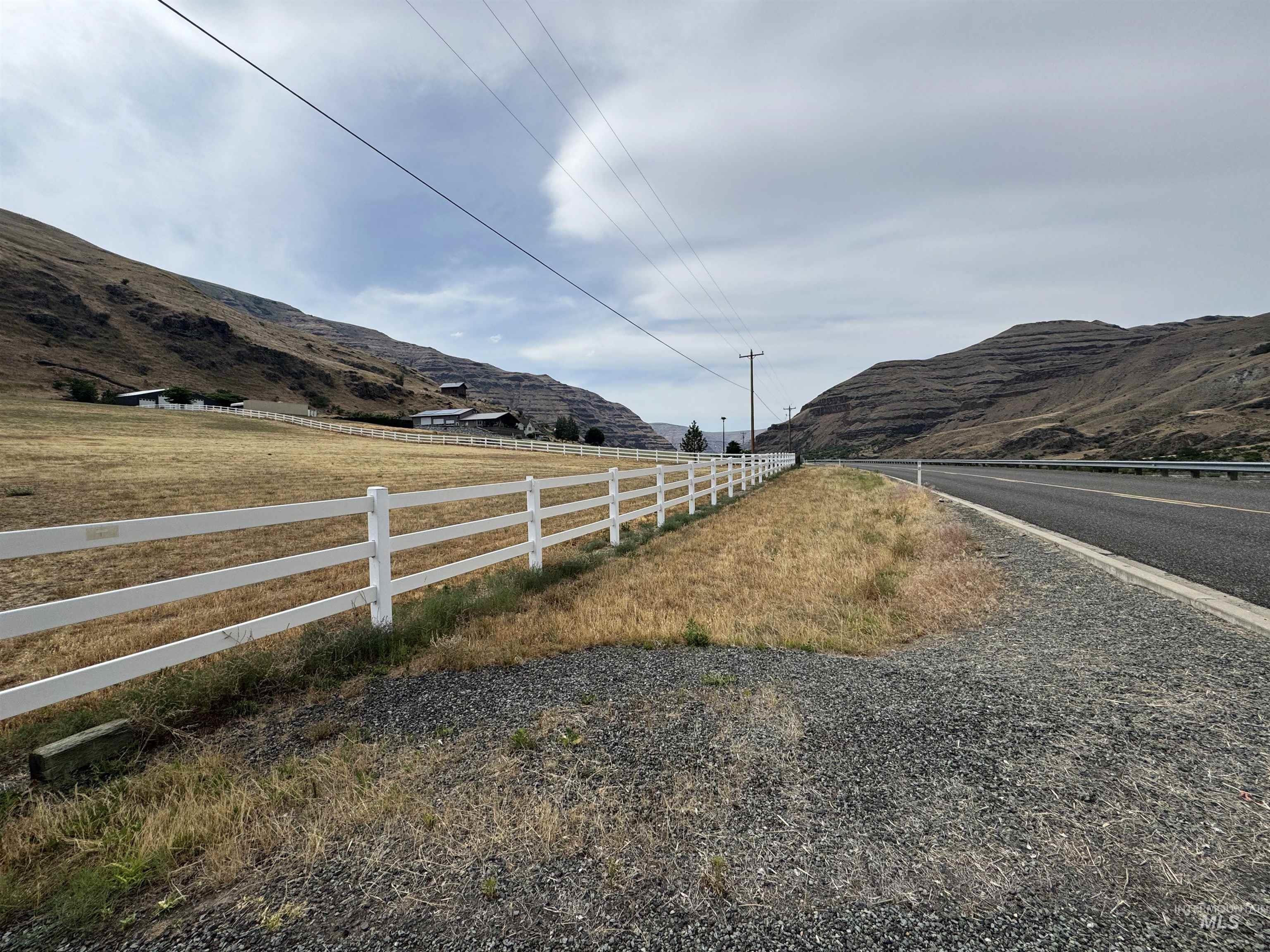 View of street featuring a mountain view and a view of countryside
