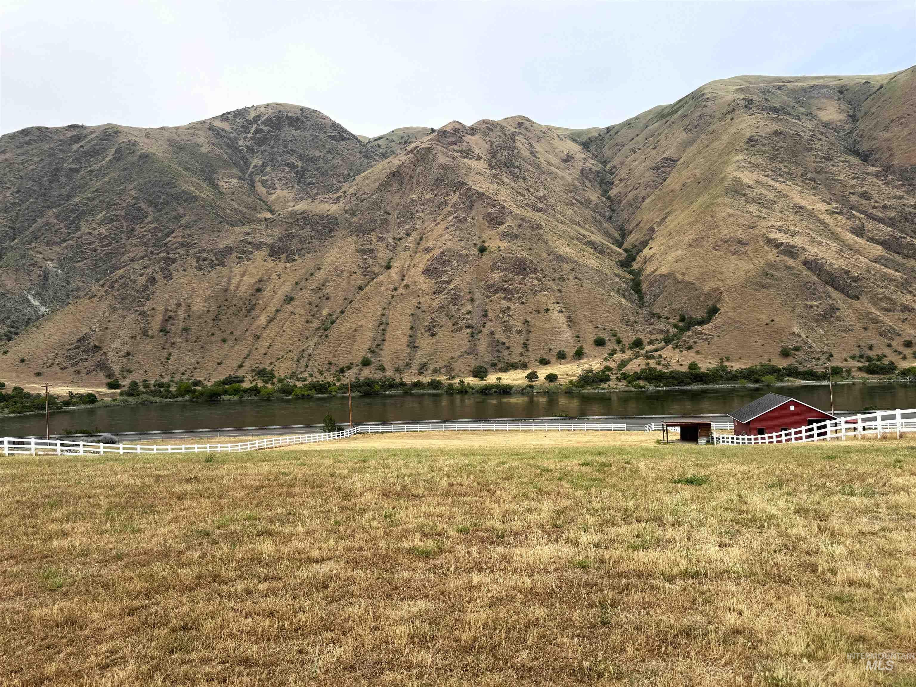 View of mountain backdrop with a large body of water