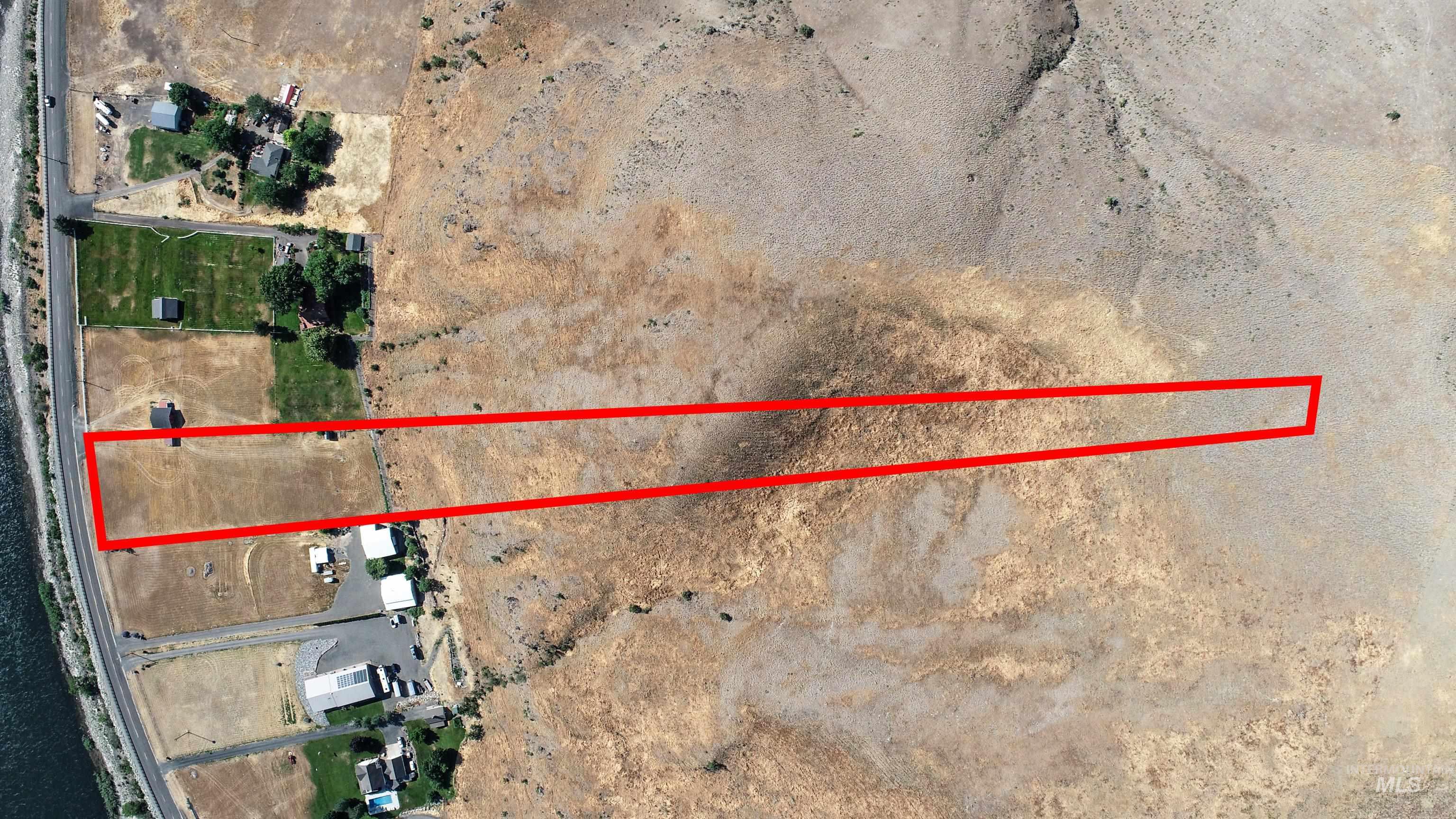Aerial overview of property's location with property boundaries highlighted