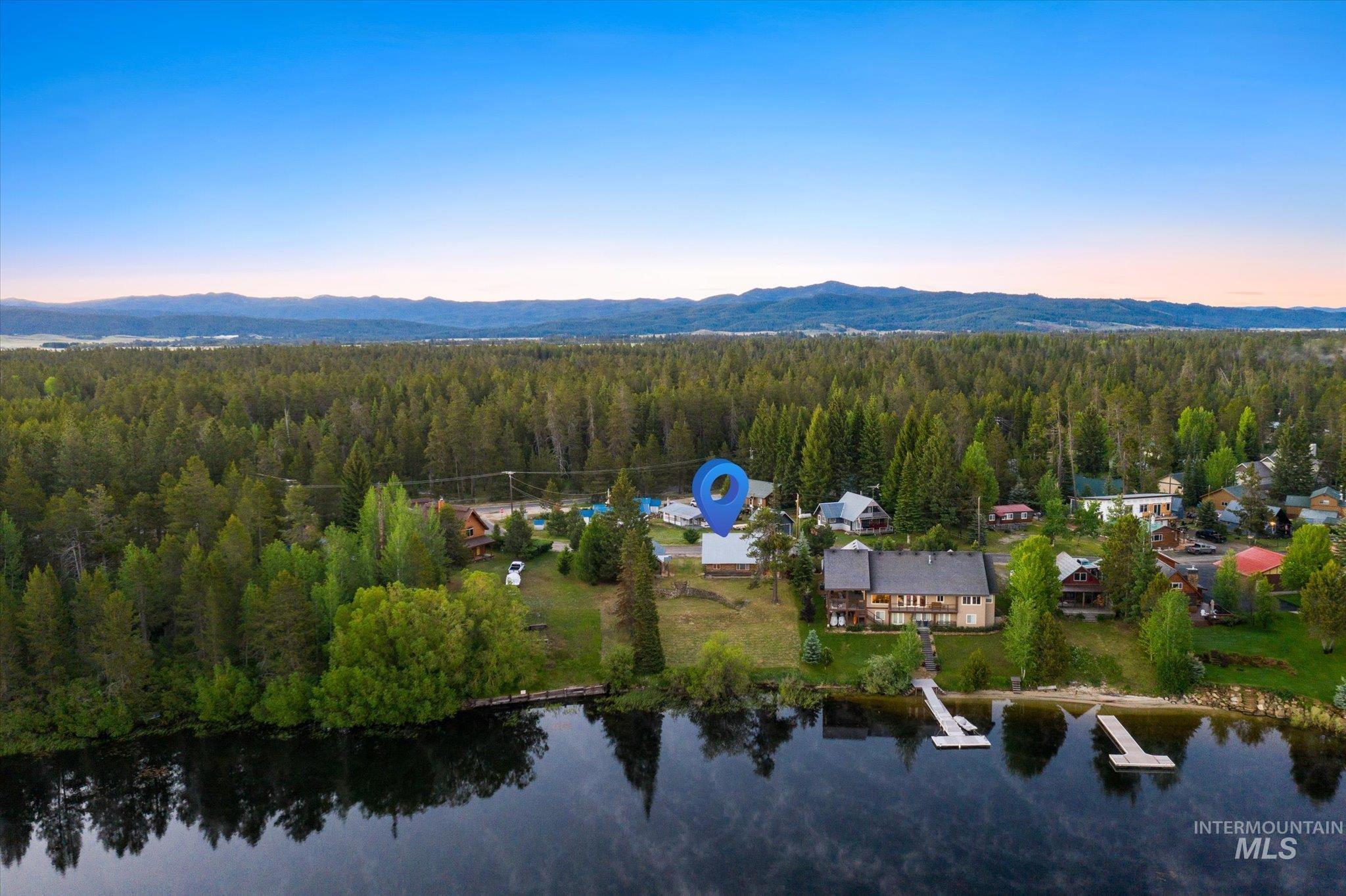 Waterfront property with two private docks and a sandy shore