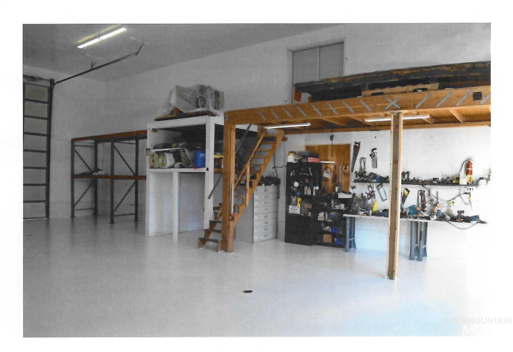Garage featuring a workshop area