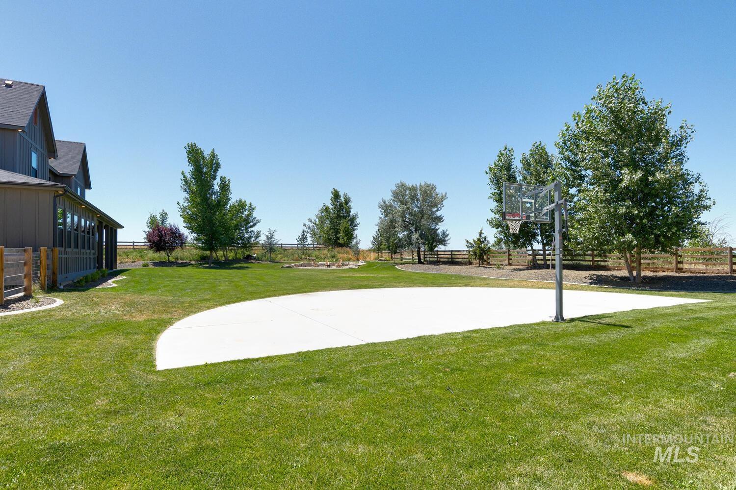 View of basketball court featuring basketball hoop