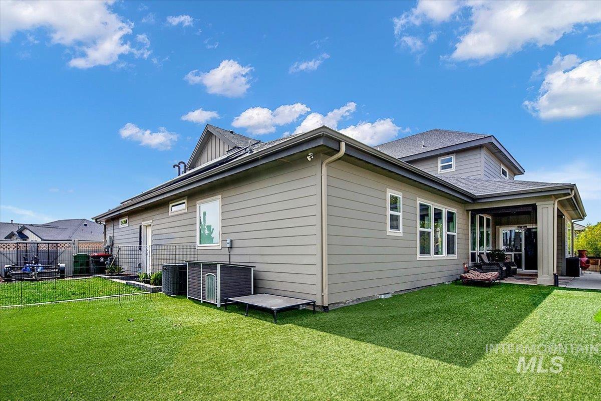 Exterior featuring horizontal siding and a covered patio area