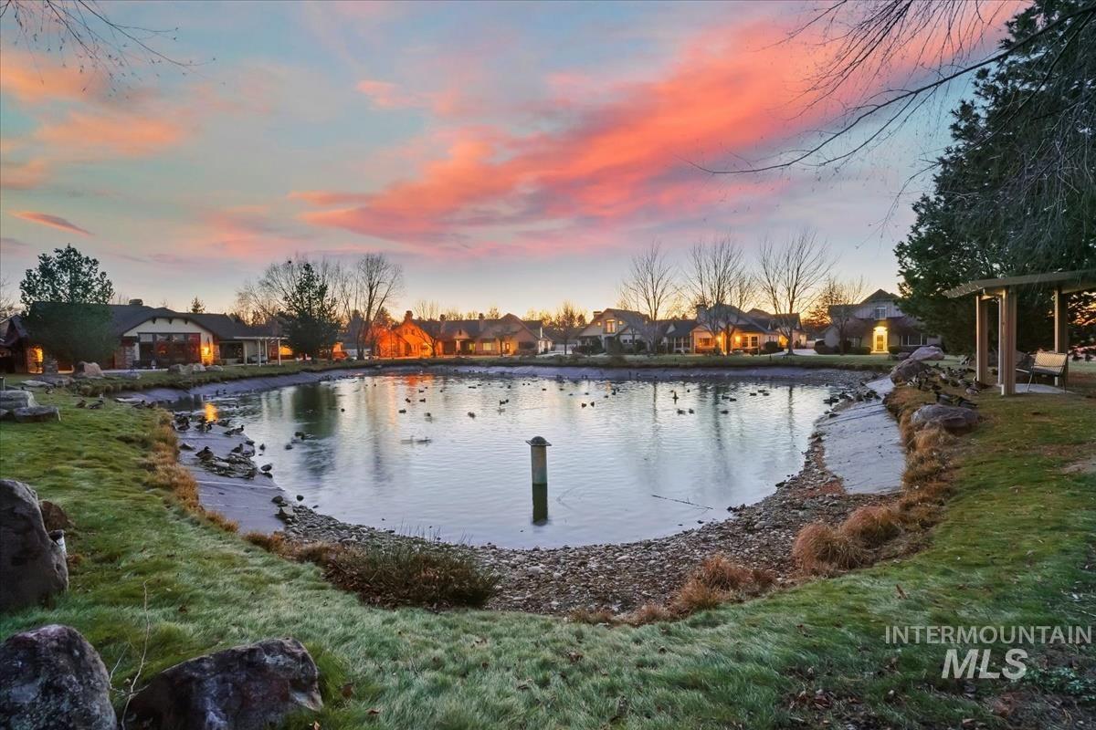 Water view featuring nearby suburban area