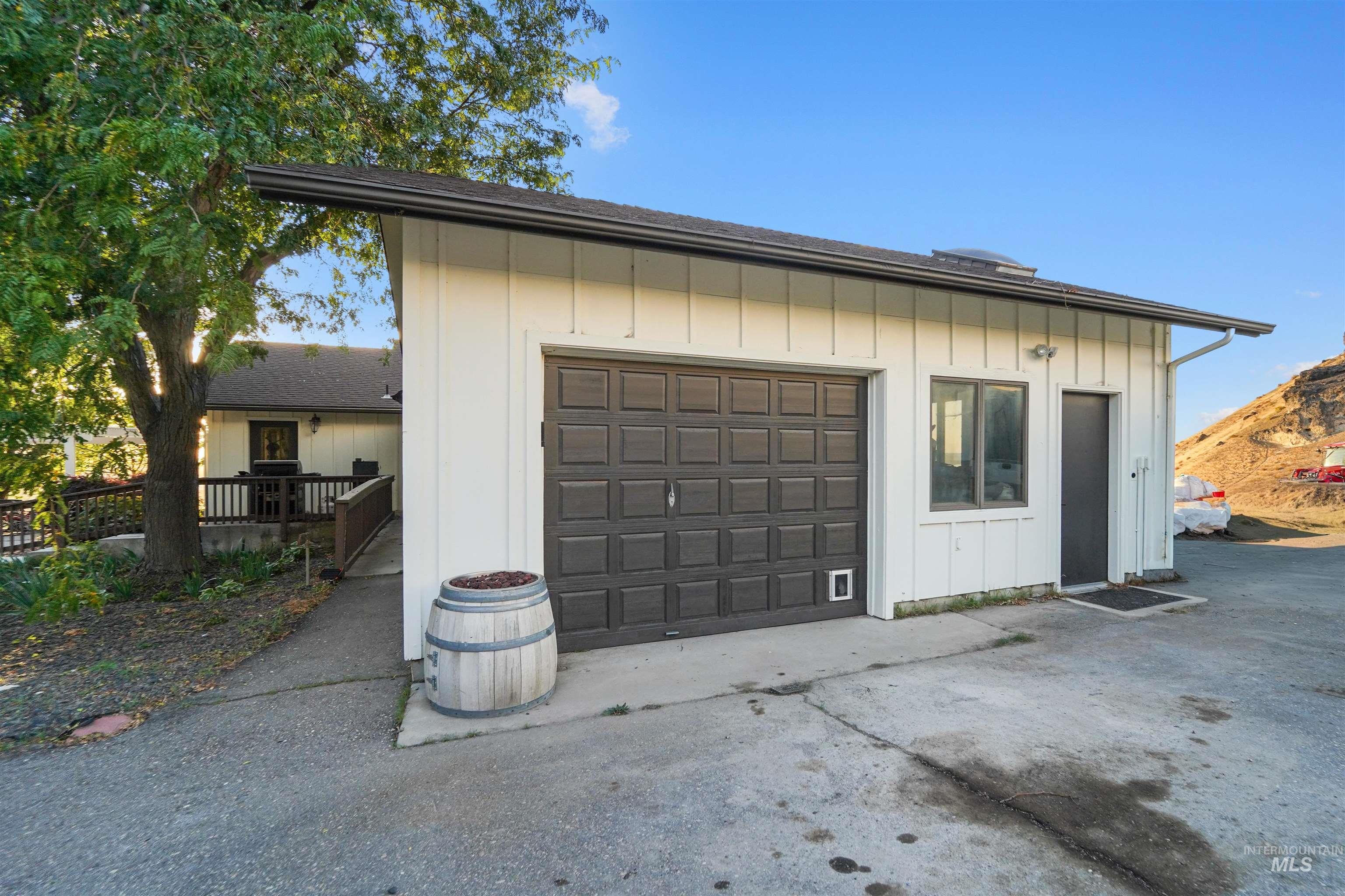 Garage with concrete driveway
