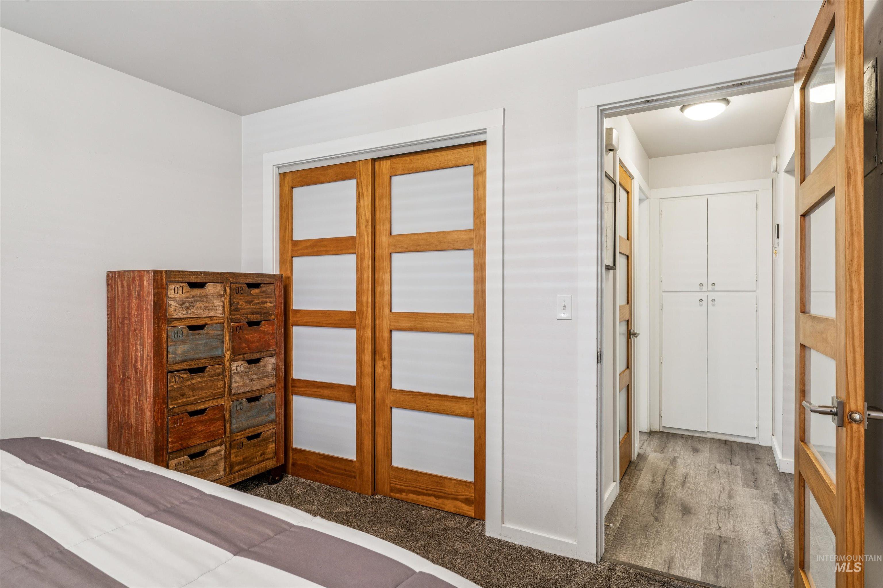 Bedroom with a closet and baseboards