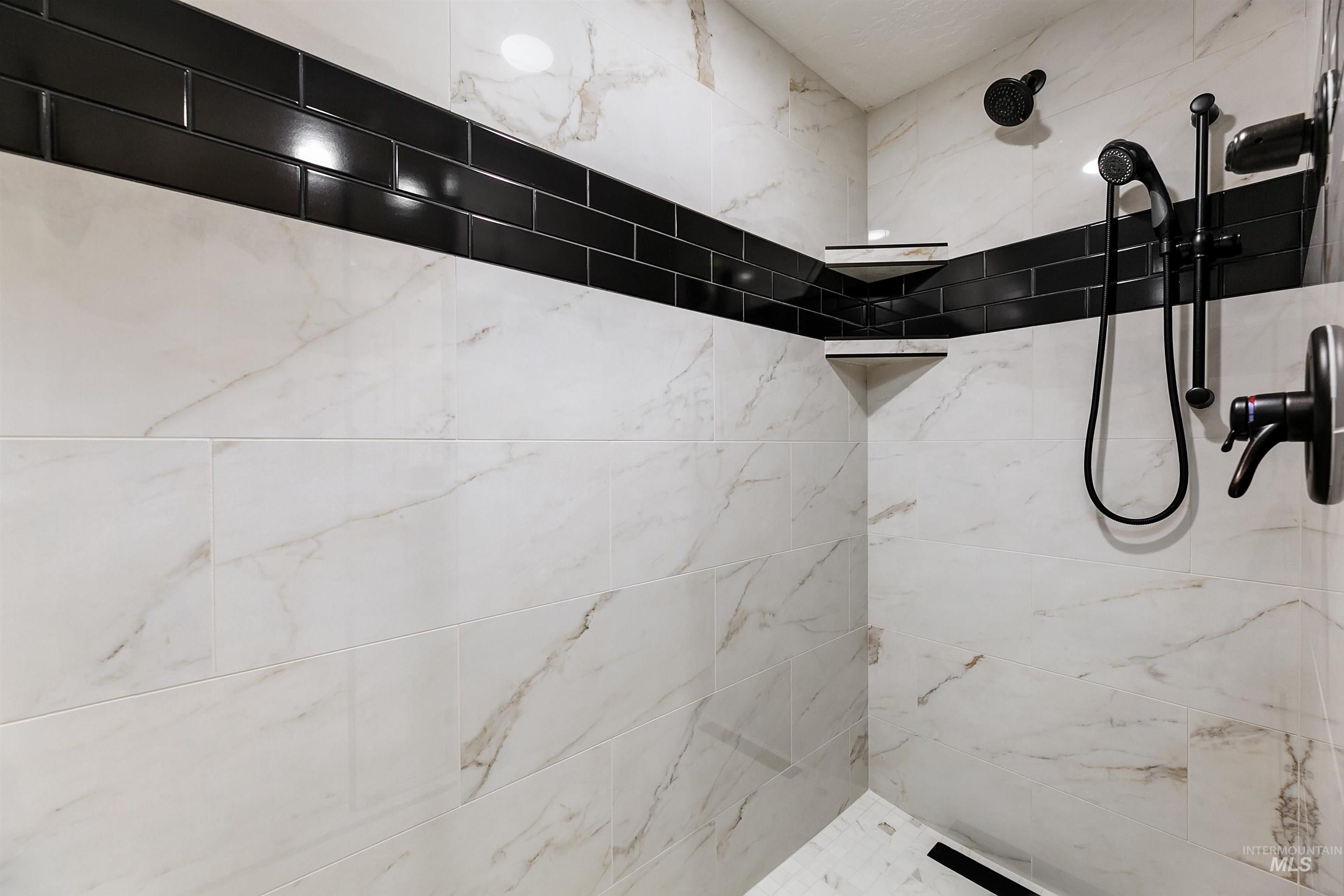 Bathroom with a tile shower