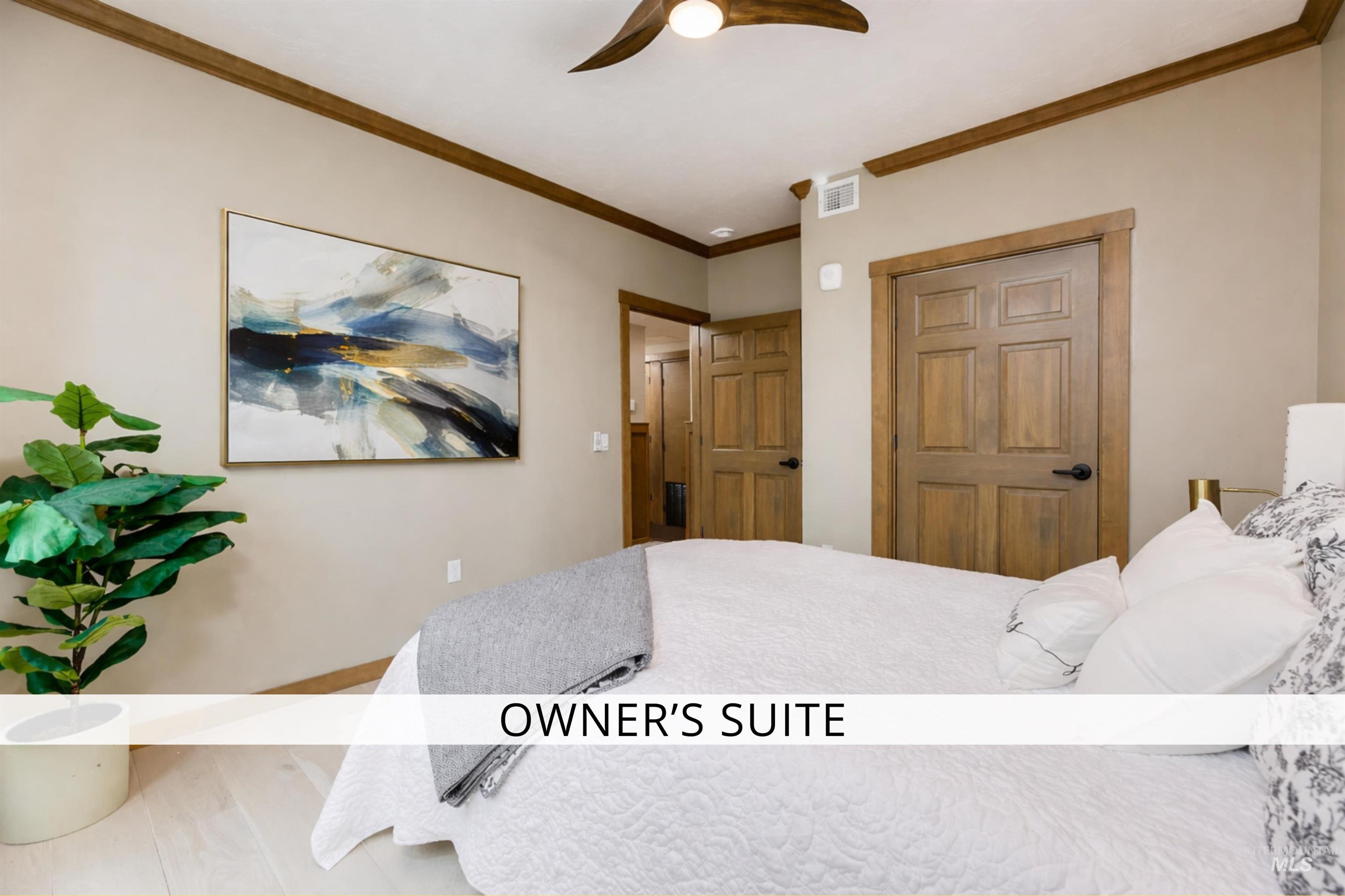 Bedroom featuring crown molding and ceiling fan