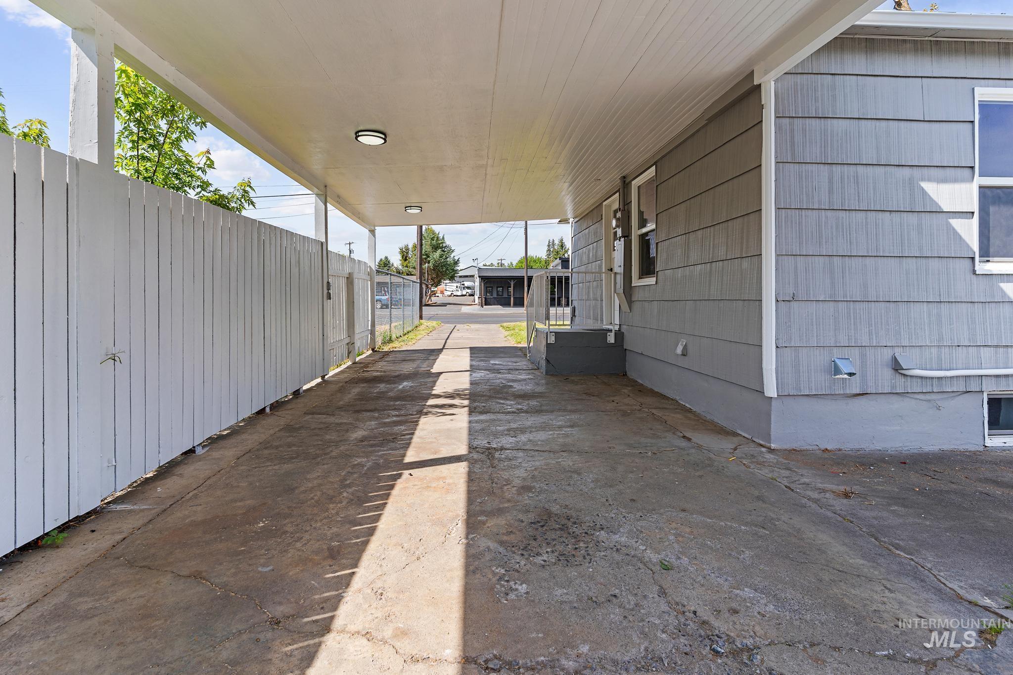 Covered carport providing sheltered parking