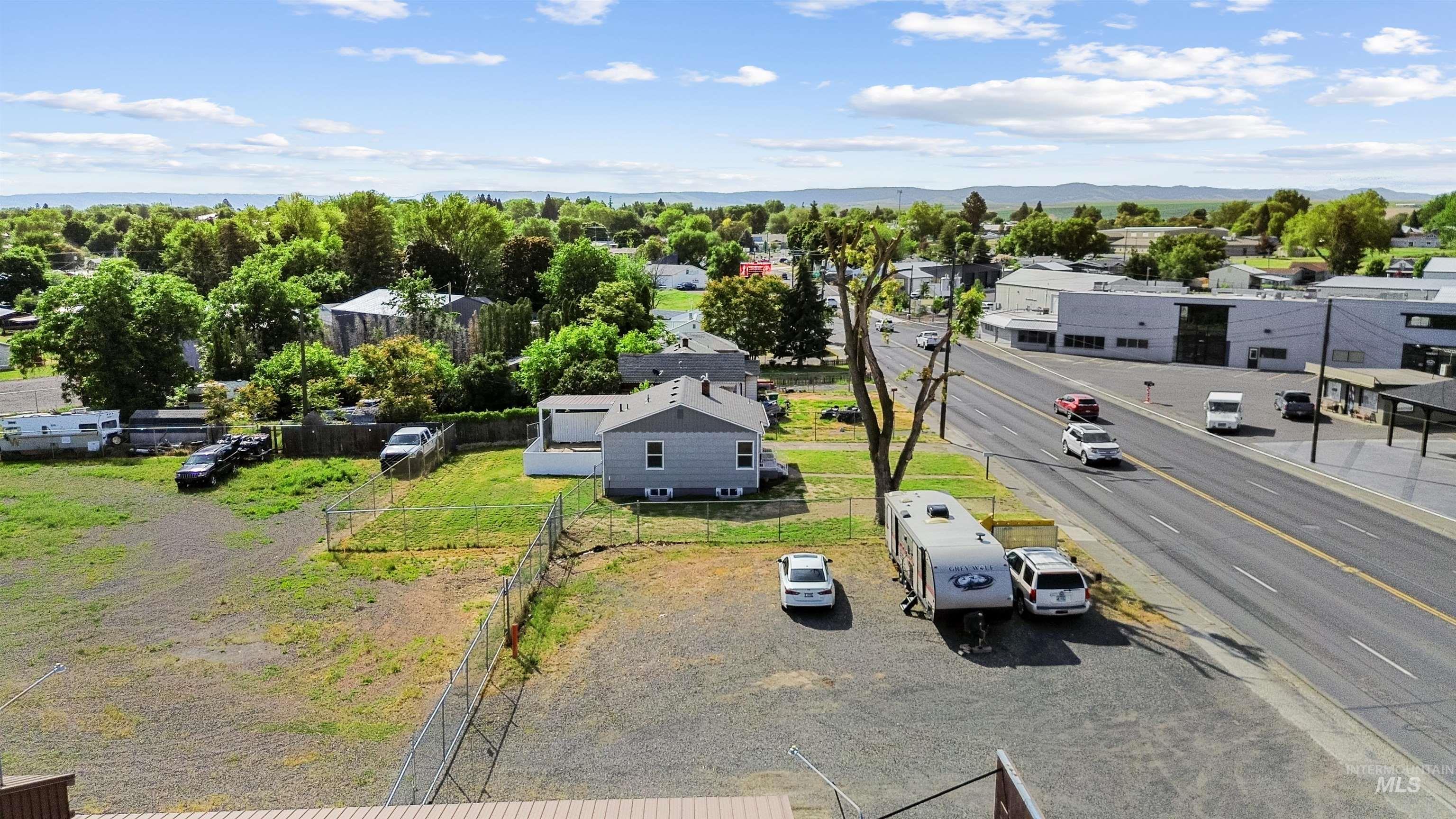 Paved commercial lot with direct street access