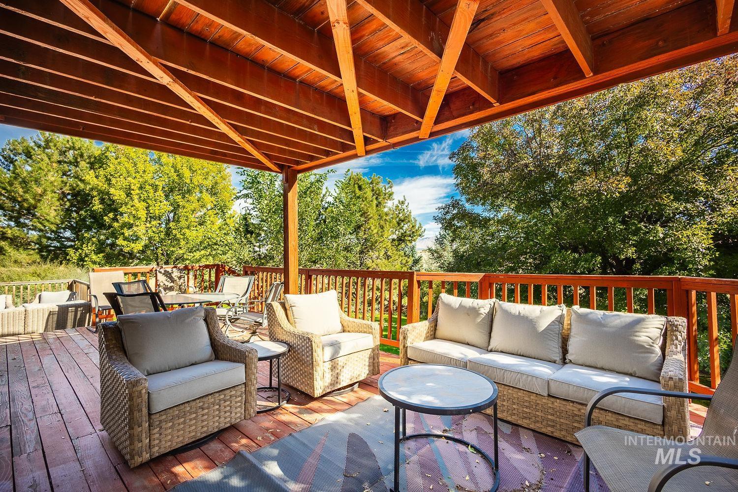 Wooden deck with an outdoor hangout area