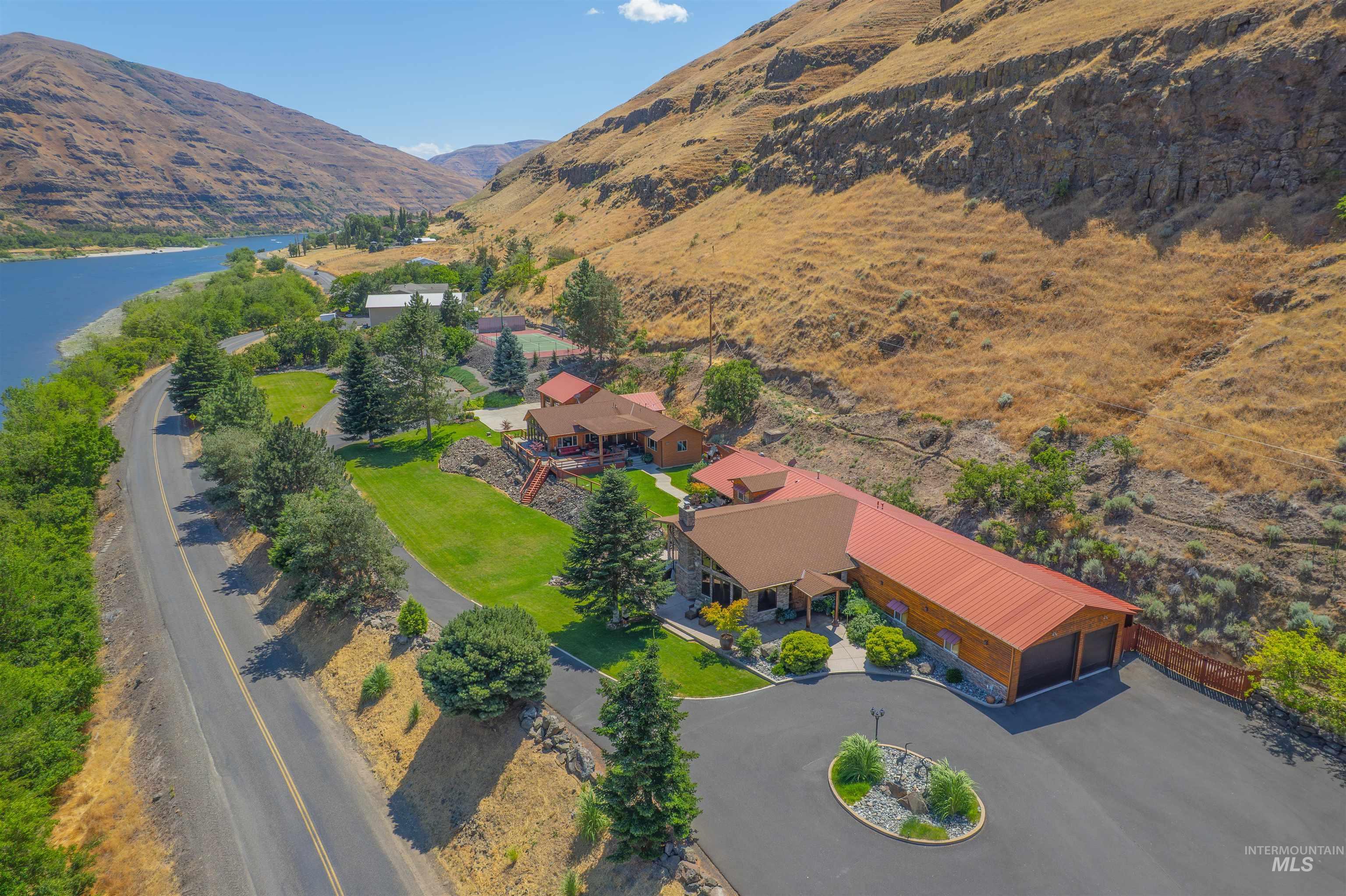 View of subject property featuring a mountain backdrop