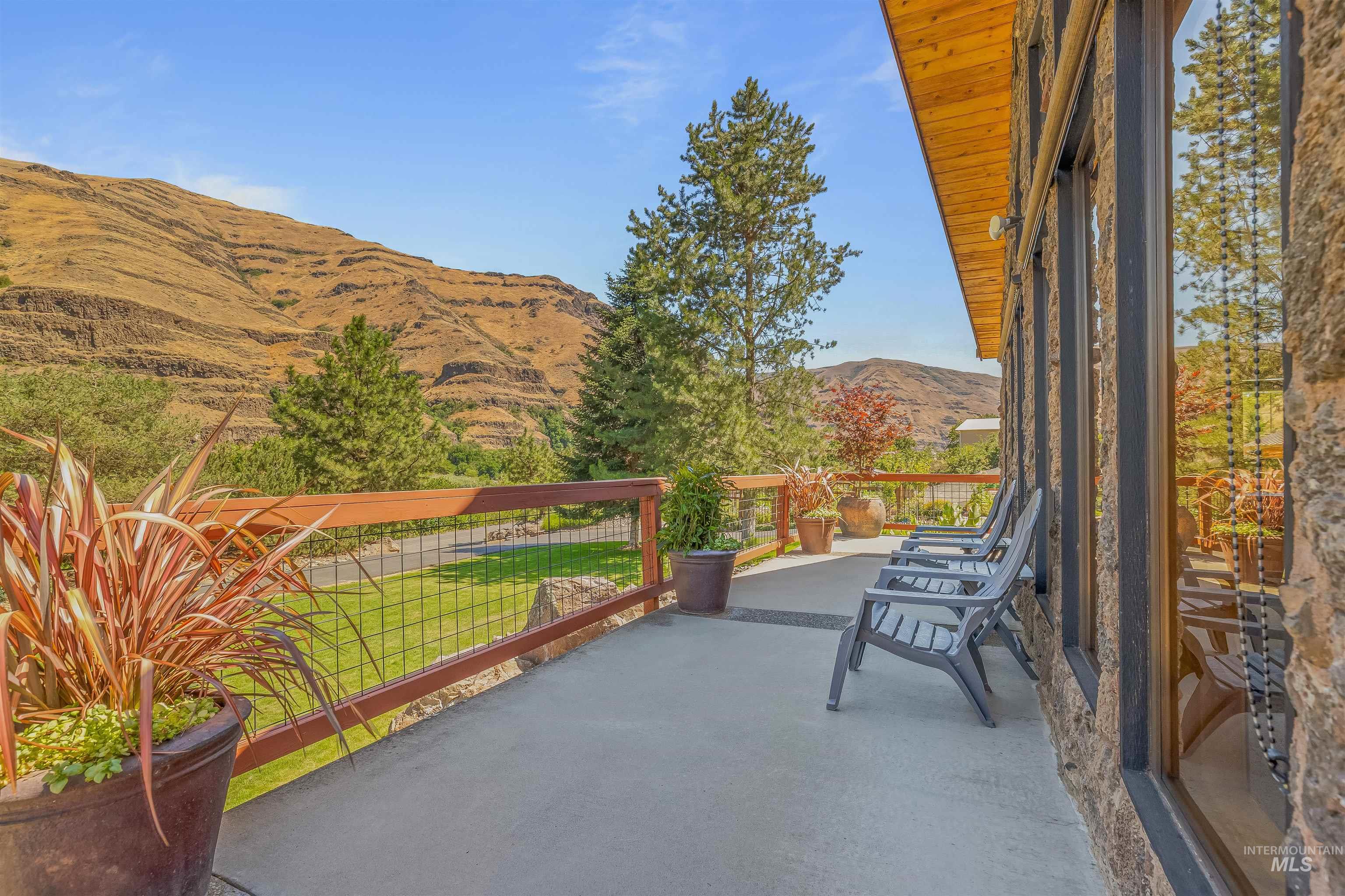 View of patio / terrace featuring a mountain view