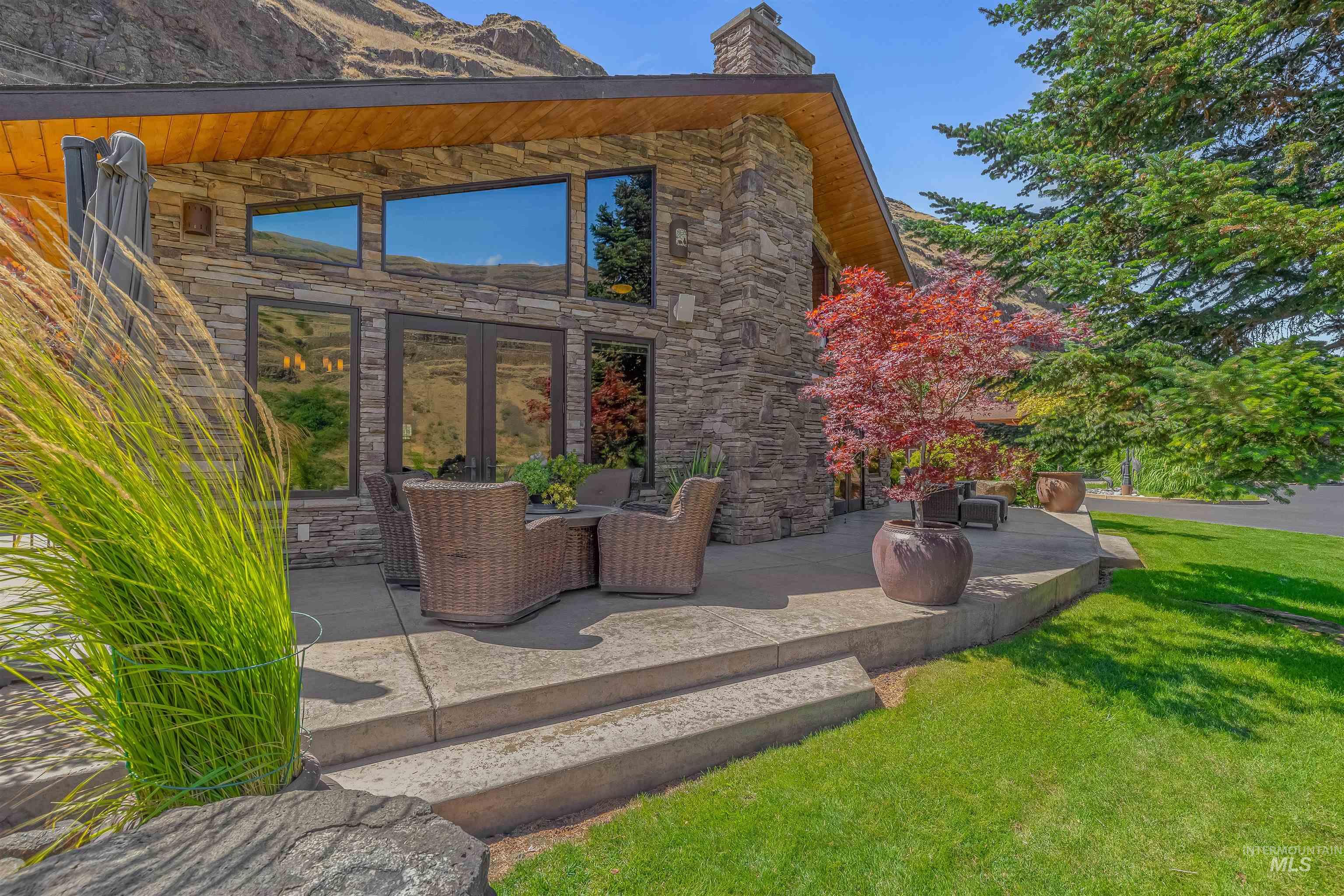 View of patio / terrace with a mountain view
