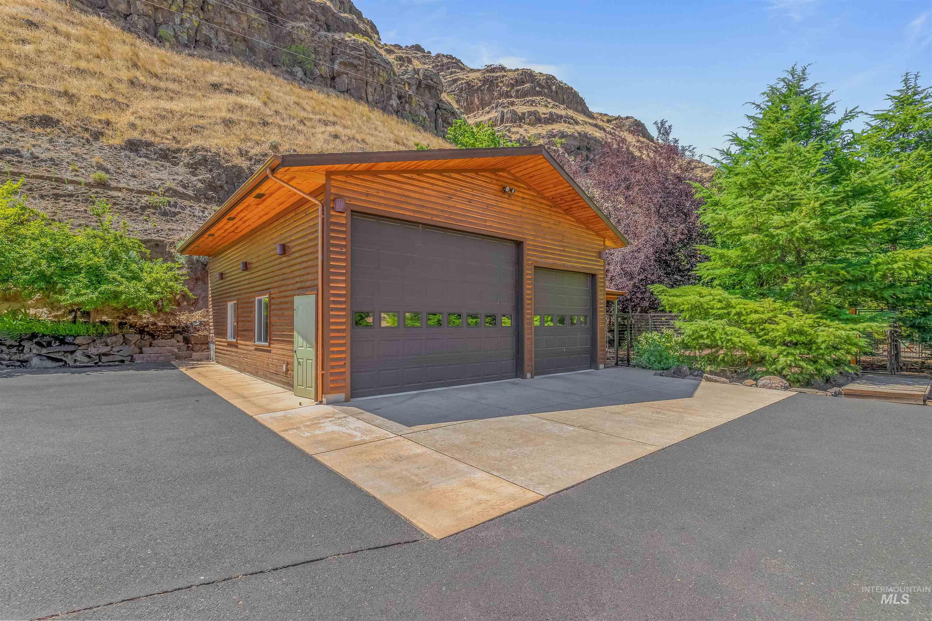 Detached garage with a mountain view