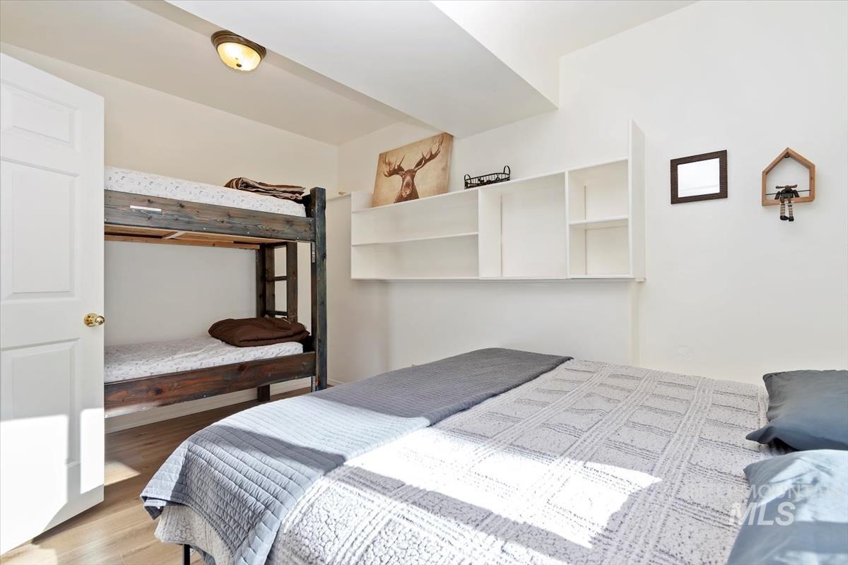 Bedroom with wood finished floors