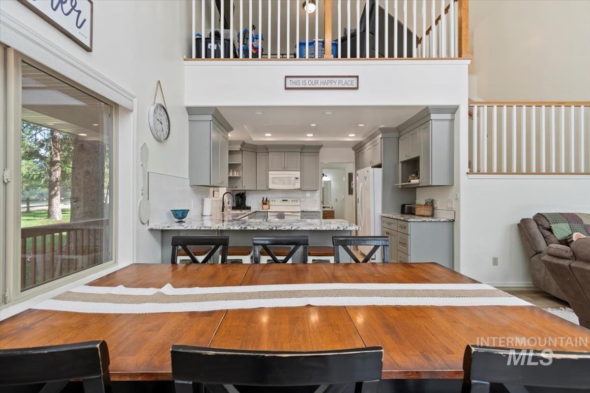 Dining room featuring a high ceiling
