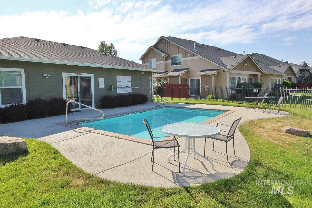 Outdoor swimming pool with concrete surround