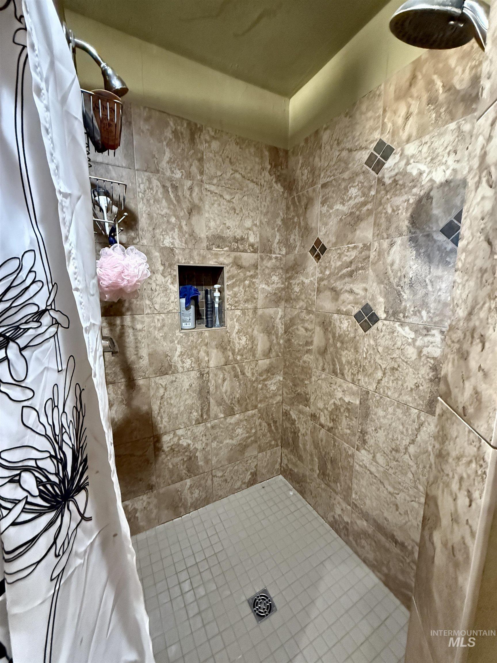 Bathroom with tiled shower