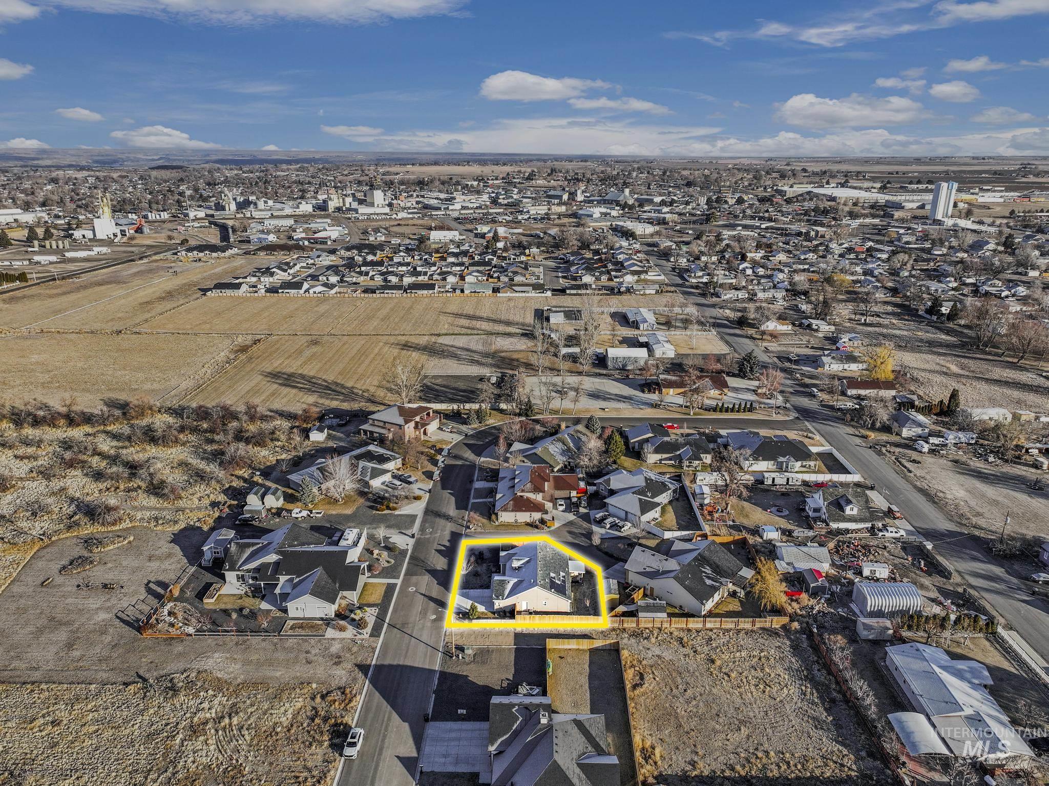 Aerial perspective of suburban area with property boundaries highlighted