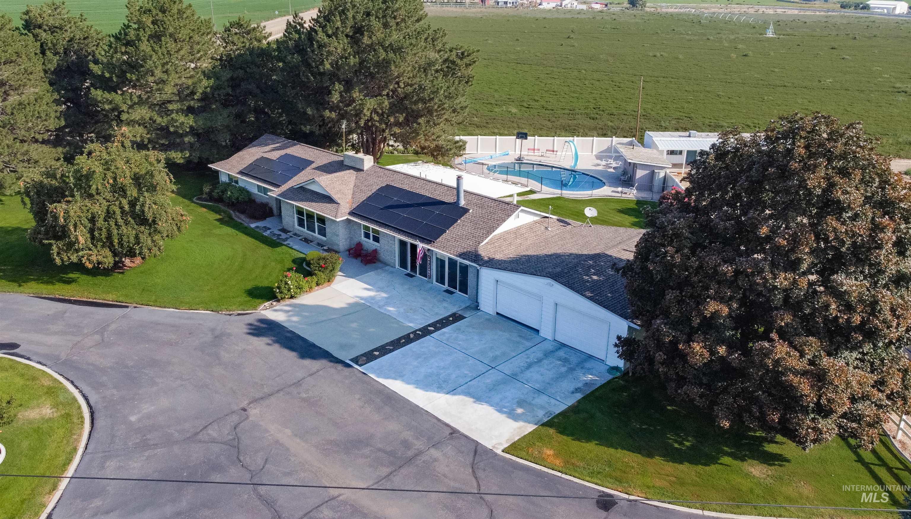 View of rural area with a pool area