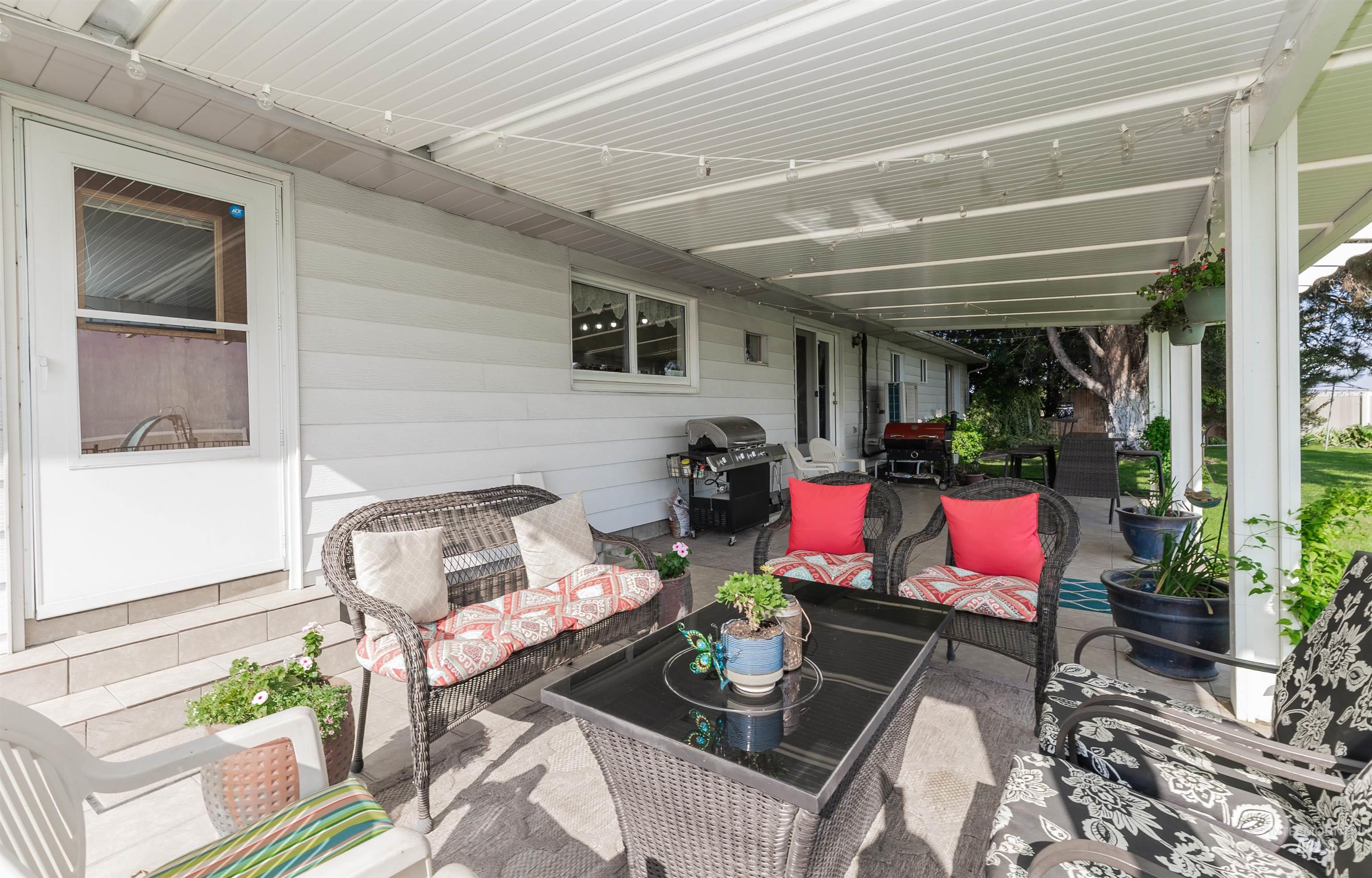 View of patio / terrace featuring area for grilling, an outdoor hangout area, and outdoor dining area.